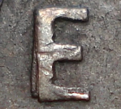 Re-engraved E in NEWF