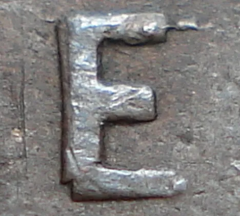 Re-engraved E in ONE