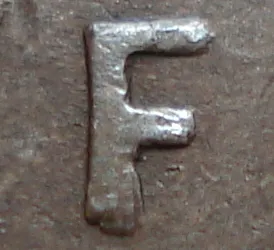 Re-engraved F in NEWF