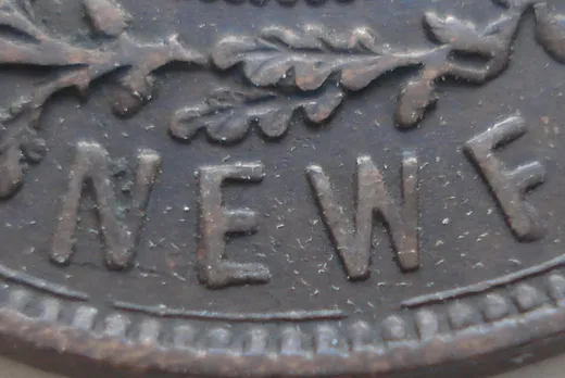 Re-engraved F in NEWF