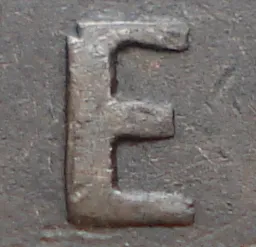 Re-engraved E in NEWF