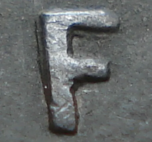 Re-engraved F in NEWF