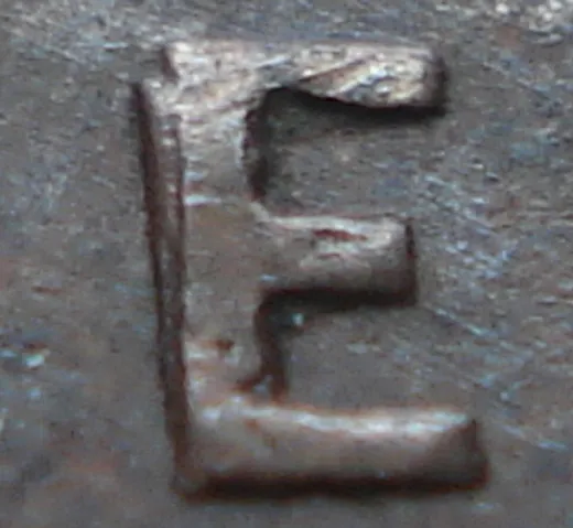 Re-engraved E in NEWF