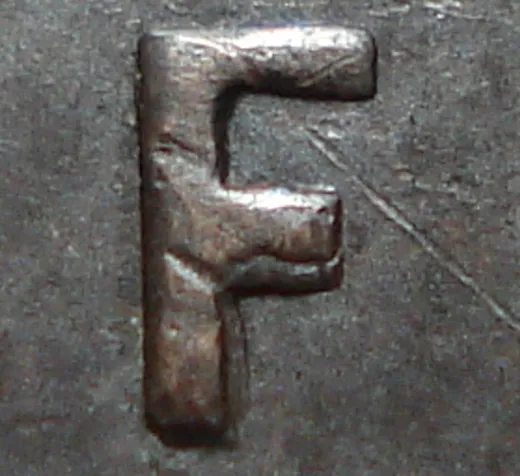 Re-engraved F in NEWF