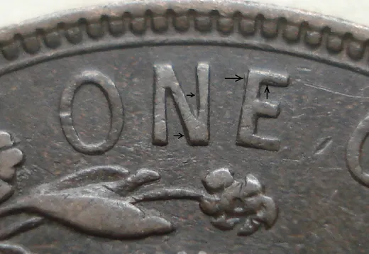 Re-engraved N & E in ONE