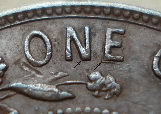 Re-engraved N & E in ONE