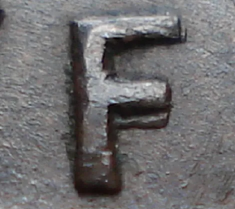 Re-engraved F in NEWF