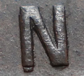 Re-engraved N in OUND