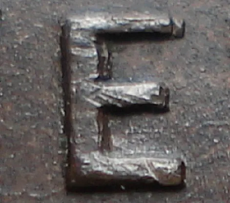 Re-engraved E in NEWF