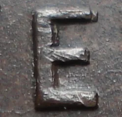 Re-engraved E in NEWF