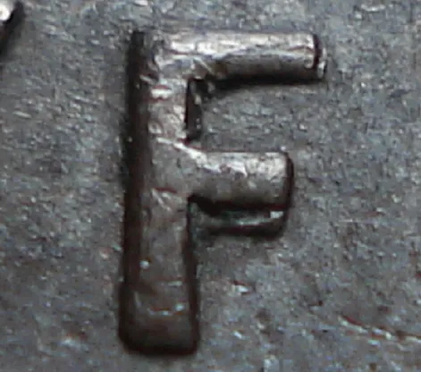 Re-engraved F in NEWF