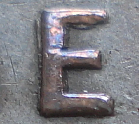 Re-engraved E in ONE