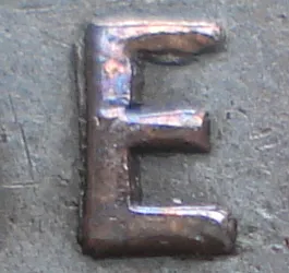 Re-engraved E in ONE
