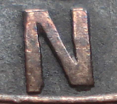 Re-engraved N in LAND