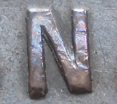 Re-engraved N in ONE