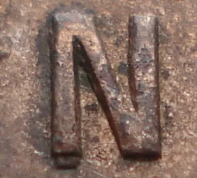 Re-engraved N in NEWF