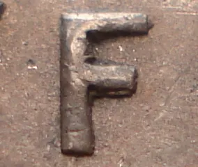 Re-engraved F in NEWF