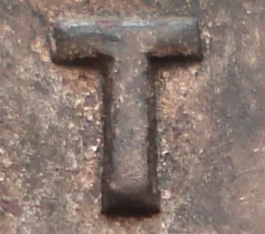 Re-engraved T in CENT