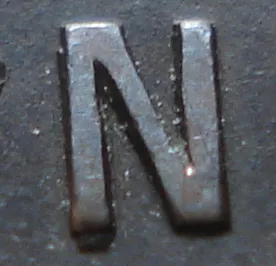 Re-engraved N in NEWF
