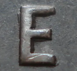 Re-engraved E in ONE