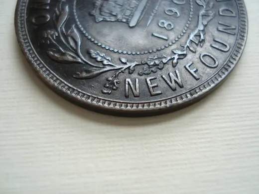 Re-engraved N in NEWF