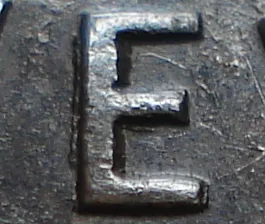 Re-engraved E in NEWF