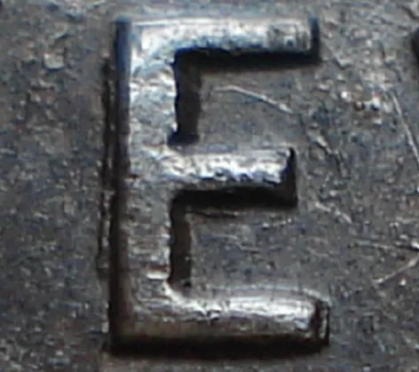 Re-engraved E in NEWF