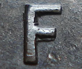 Re-engraved F in NEWF