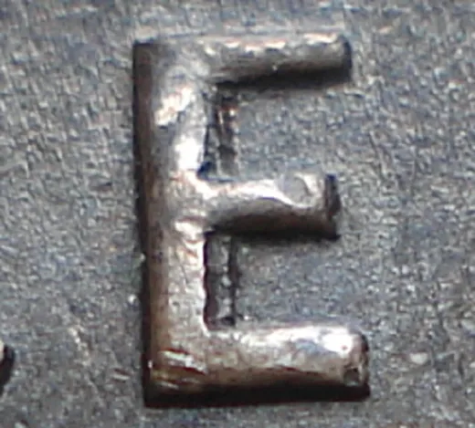 Re-engraved E in CENT