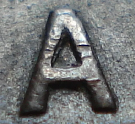 Re-engraved A in LAND