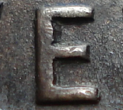 Re-engraved E in NEWF