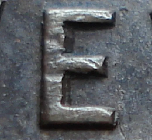 Re-engraved E in NEWF