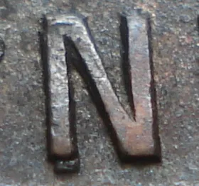 Re-engraved N in NEWF