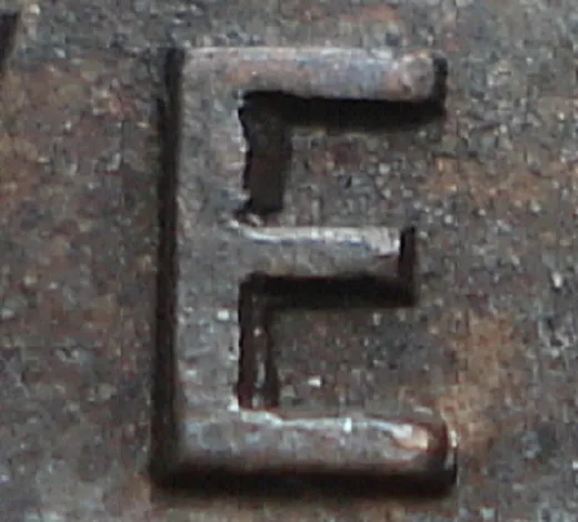 Re-engraved E in NEWF