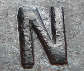 Re-engraved N in OUND