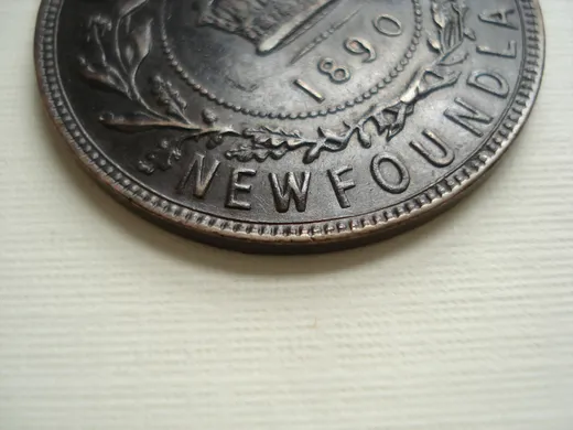 Re-engraved W in NEWF