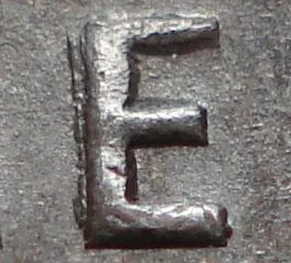 Re-engraved E in ONE