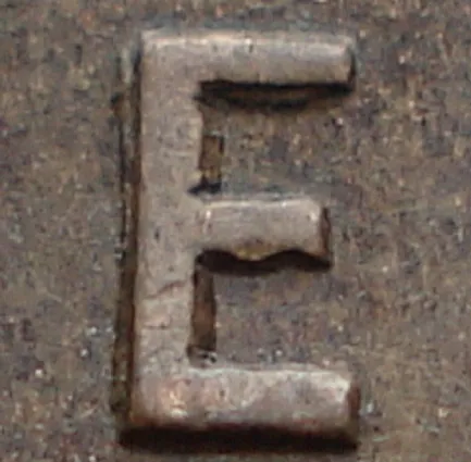 Re-engraved E in ONE