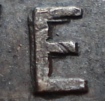 Re-engraved E in NEWF