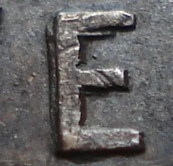 Re-engraved E in NEWF