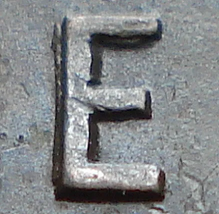 Re-engraved E in ONE