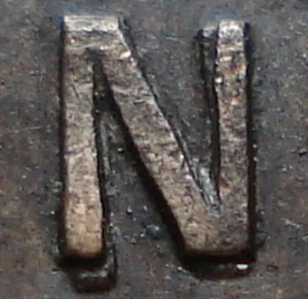 Re-engraved N in NEWF