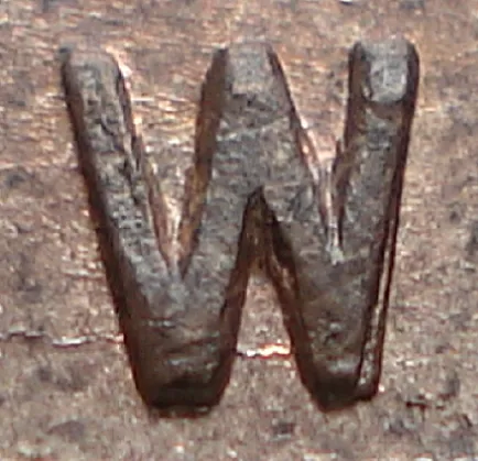 Re-engraved W in NEWF