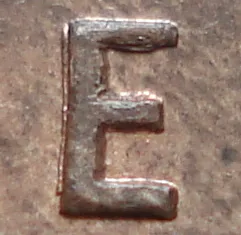 Re-engraved E in ONE