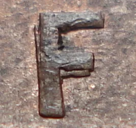 Re-engraved F in NEWF
