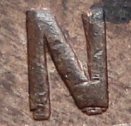 Re-engraved N in OUND