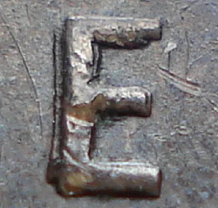 Re-engraved E in ONE