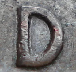 Re-engraved D in LAND