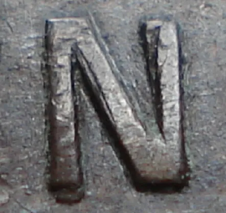 Re-engraved N in NEWF