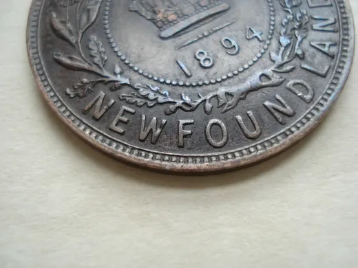 Re-engraved F in NEWF